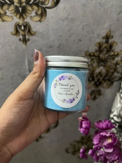 A beautiful pastel blue candle, customized for a birthday. Our silver lid jars are a bestseller.