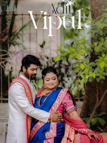 A beautifully styled portrait of the couple, framed by lush greenery, with elegant text overlay that makes it perfect for sharing.