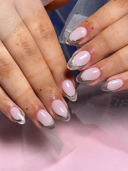 Another view of the trendy silver chrome French tip design.
