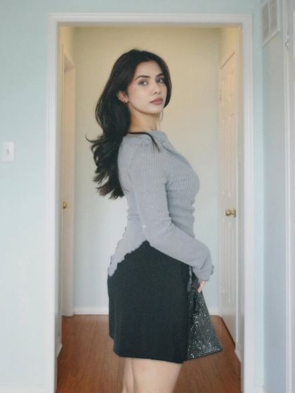 A three-quarter view from the back, showing the unique cut of the top.