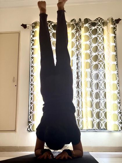 Time to go upside down with Pincha Mayurasana. This forearm stand is a powerful inversion that strengthens the shoulders and back while calming the mind.