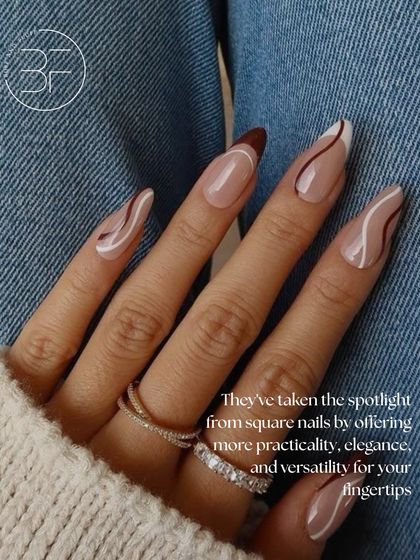 A closer look at a beautiful abstract design on almond-shaped nails, proving that this shape is perfect for both simple and creative art.