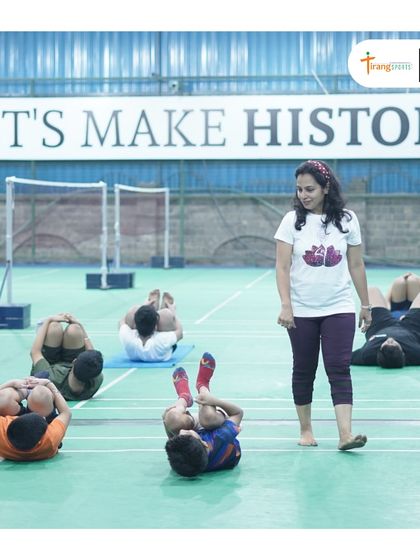 A yoga session in progress at our Dwarka center. I incorporate wellness activities like yoga to help athletes with flexibility, focus, and injury prevention.