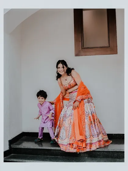 Candid moments with the little ones are always special. I captured this sweet interaction between the bride, Ankita, and a young family member during her Mehendi ceremony.