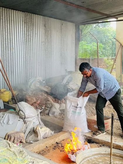 Conducting a Raku workshop at Hope Town school in Dehradun. Here, we are preparing the reduction chamber with combustible materials.