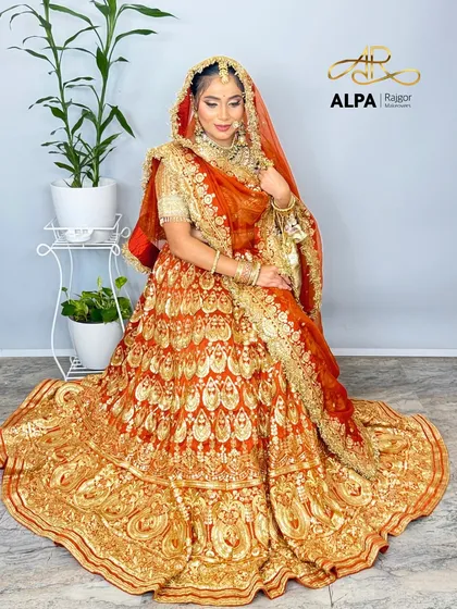 The bride adjusting her veil, a classic shot that captures the essence of bridal elegance.
