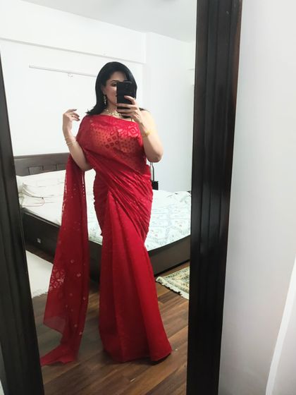 The full look of my red Jamdani saree. The lightweight fabric and intricate work make it a comfortable yet festive option for any celebration.
