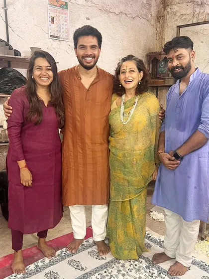 A happy moment captured during the festivities. The smiles on everyone's faces reflect the joy and camaraderie of the celebration.