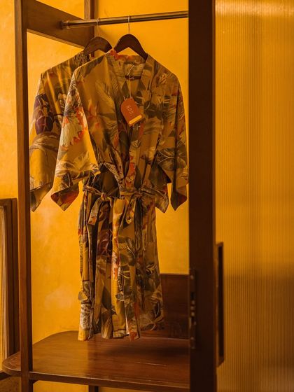 We provide beautiful, custom-printed robes for our guests to relax in, adding a touch of wearable art to your stay.