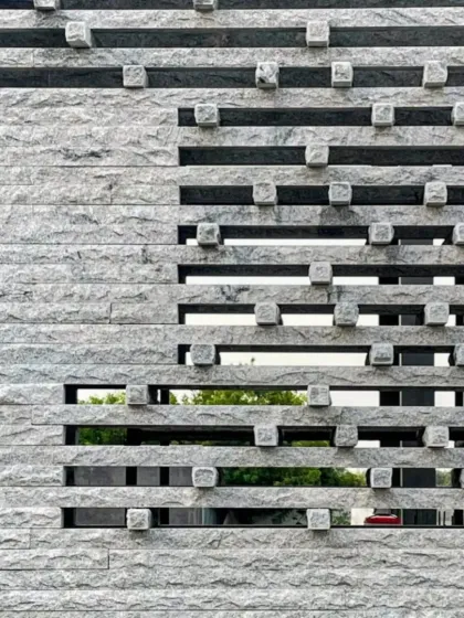A detail of the granite jaali at our Tiruppur house. The screen is a modern interpretation of a traditional element, providing ventilation and privacy.