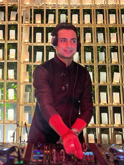 In front of a wall of candles, setting a Sufi night vibe. Even in a more mellow setting, the momentum and energy are key.