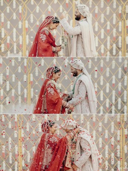 A sequence of the Varmala ceremony, capturing the playful and joyous exchange of garlands between the couple.