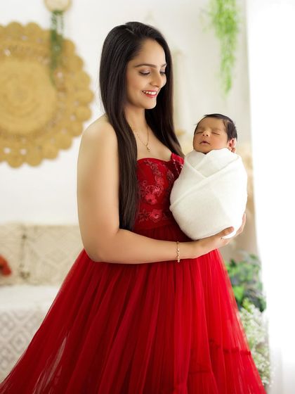 A close-up portrait of the mother and her newborn, highlighting their loving connection.