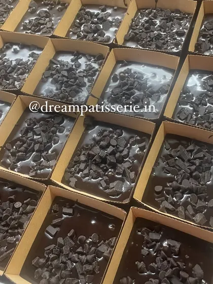 For the chocolate purists, here are trays of our brownie batter generously topped with chocolate chips before going into the oven. This was another popular item in our corporate hampers.