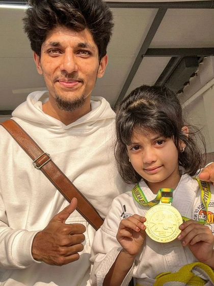 Congratulations to Tuba on her gold medal. A proud moment for a dedicated young athlete.