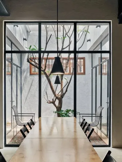 Our courtyard is a visual delight of sunlight and greenery. It also serves a practical purpose as the perfect spot for viewing material samples in natural daylight.