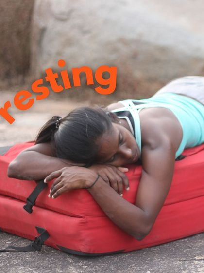 Climbing is resting. Knowing when to take a break is just as important as knowing when to push. A well-deserved nap on a crash pad!