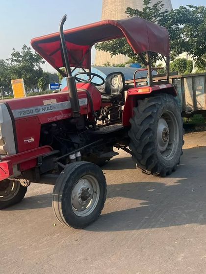We own and operate a fleet of heavy-duty equipment, including tractors like this one. This allows us to efficiently handle large-scale landscaping projects, from soil preparation to material transport.