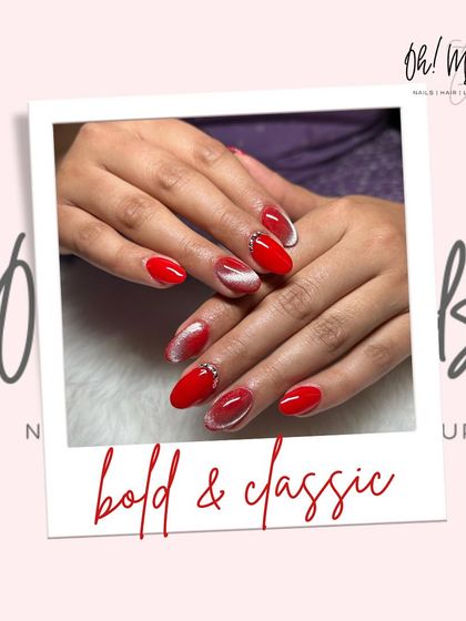 Bold, classic, and always in style. This set features a vibrant red cat eye polish with a subtle silver crystal accent for a touch of sparkle.