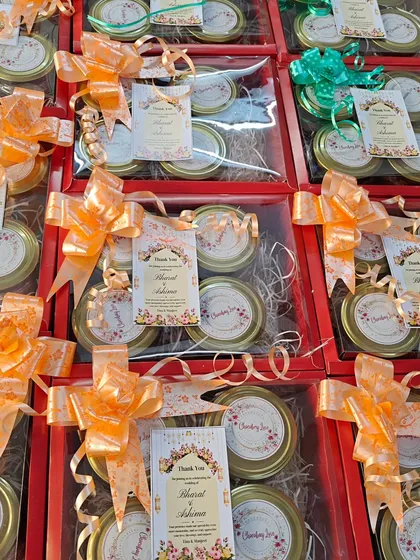 These wedding hampers, featuring four jars in a red box with a personalized thank you card, were a popular choice this wedding season.