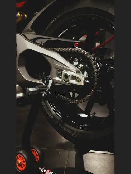The single-sided swingarm of the Ducati Panigale V4, a signature of Italian design and engineering.