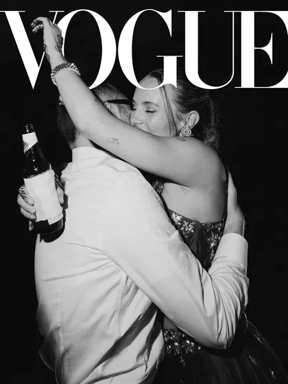 A hug that says everything. This black and white, Vogue-style shot captures a raw, emotional embrace on the dance floor, a moment of pure connection amidst the celebration.
