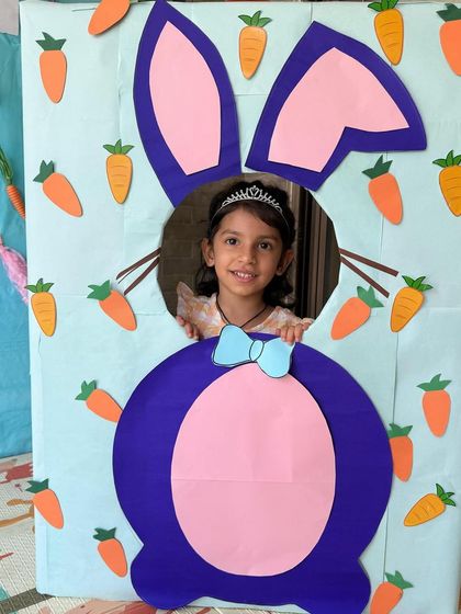 What a super cute Easter bunny! We always include fun photo props and backdrops in our festival sessions, like this bunny cutout board.