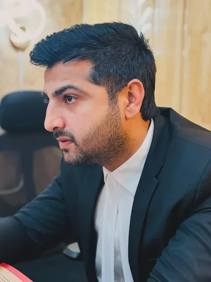 A side profile shot while working. Concentration is key when drafting legal documents.