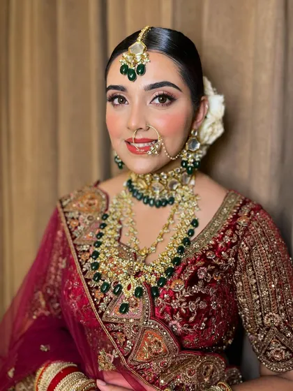 Minimal magic for this bride. A close-up shot showcasing the soft, glowing skin and the elegant eye makeup.