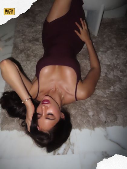 Another angle of this moody and glamorous shoot. The makeup is blended perfectly to look seamless even in unconventional poses.