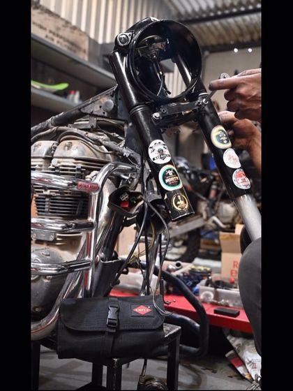 A tool is an extension of the hand. Here, one of our mechanics is using Knipex tools on a classic Royal Enfield.