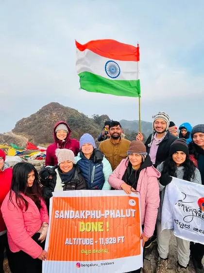 Celebrating the successful summit of Sandakphu. This is what teamwork and determination look like at 11,929 feet.