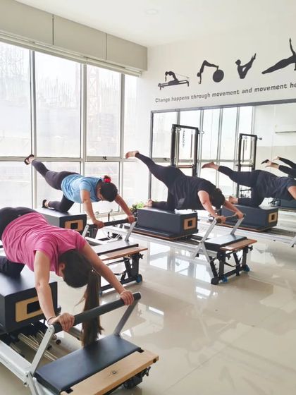 Here's a beautiful moment of synchronized movement in a group class. This exercise requires control and builds strength through the entire posterior chain.