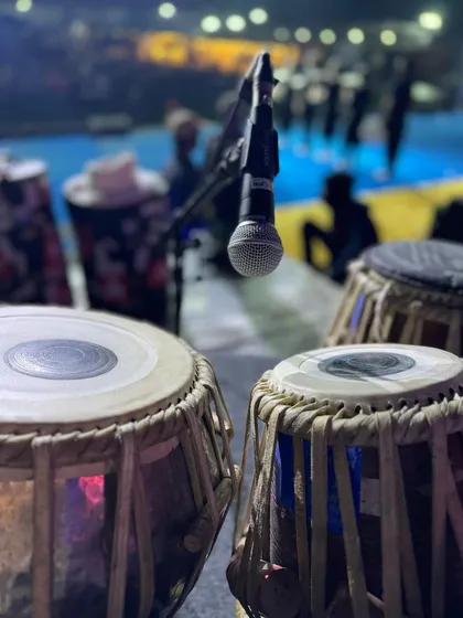 A close-up of my tabla setup on stage at a large event in Goa. This perspective shows the professional miking techniques used to capture the best possible sound during a live performance.