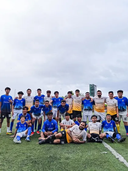 We offer a clear pathway for dedicated players. This photo shows our academy players, a mix of working professionals and U-17 athletes, during exclusive trials for our senior MFA league team. Your football journey can grow with us.