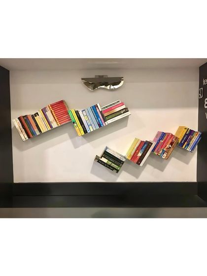 This design challenges the conventional idea of a bookshelf, making it a conversation starter.