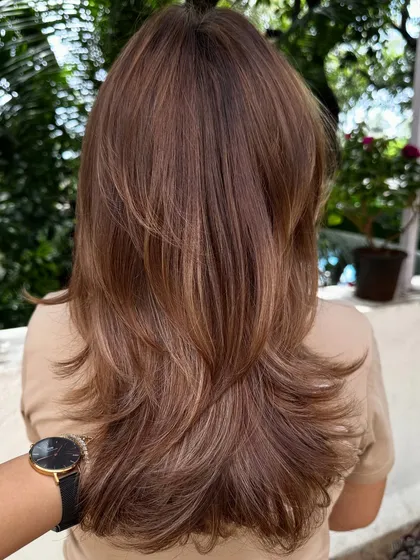 A collection of my hair transformations featuring beautiful warm tones. From caramel to copper, these colors are perfect for adding a sun-kissed glow and dimension.