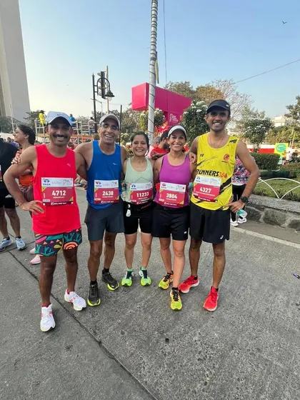All smiles after the race. The shared experience of conquering the marathon distance creates a special bond between runners.