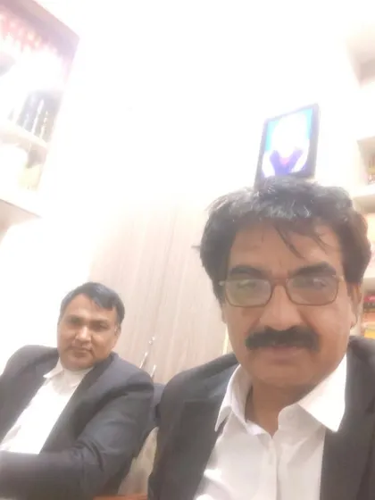 A moment with my colleague Rajesh Khari Gujjar ji in the chamber. The life of a lawyer is about navigating professional challenges together.