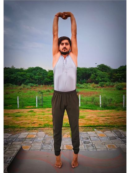 Tadasana, or Mountain Pose, is the foundation for all standing poses. It seems simple, but it is key for improving posture, maintaining balance, and calming the body and mind.