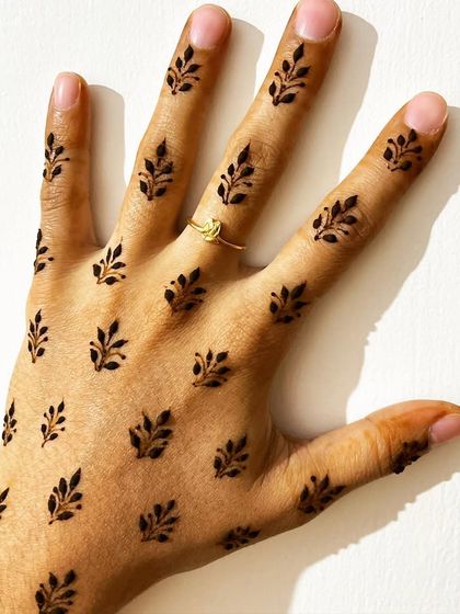 A beautiful shot of the scattered leafy sprig design, showing its modern and elegant feel.