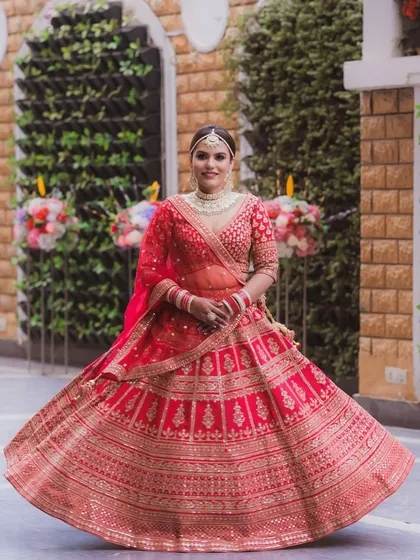 A joyful, twirling shot that captures the energy of the day. The makeup is set to be transfer-proof and sweat-proof, allowing the bride to celebrate without worry.