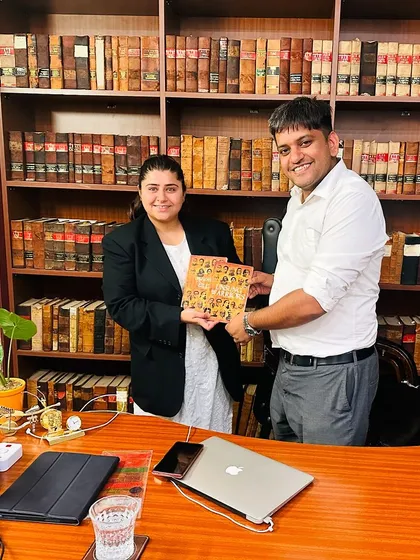 Receiving the book 'Unsung Warriors' from Advocate Aditi Sharma in my office. It is important to support the work of colleagues who highlight our nation's history.