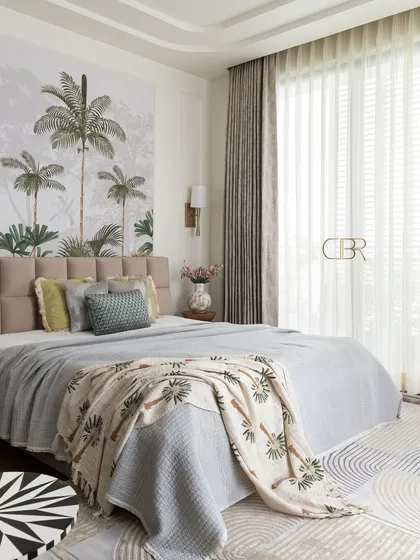 A bedroom should be a personal retreat, and for this master suite, I brought nature indoors with a custom tropical wall mural. The design balances this serene backdrop with a plush, tufted headboard and soft, layered textiles, creating a tranquil escape that feels both luxurious and grounded.
