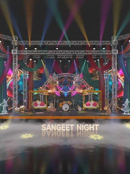 A colorful and traditional Sangeet night concept in 3D. This design incorporates vibrant drapes, swings for seating, and traditional motifs, blending modern stagecraft with cultural elements.