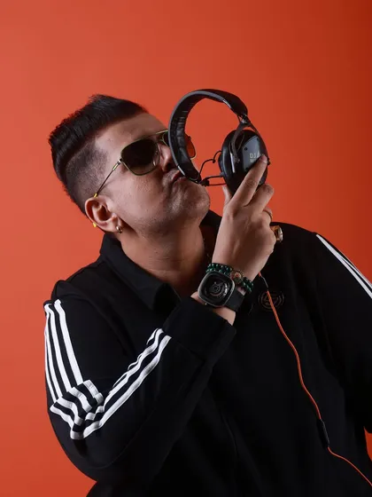 Kissing the headphones. A classic DJ pose that shows my love and respect for the tools of my trade.