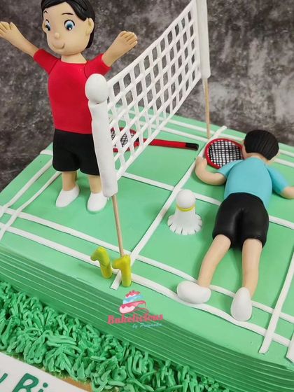 Another angle of the detailed badminton court cake, perfect for any fan of the sport.