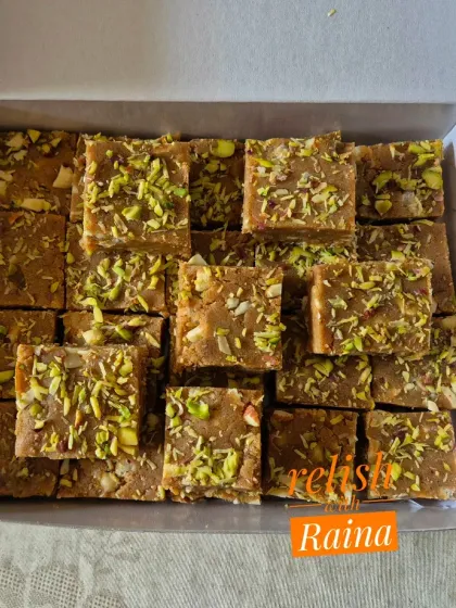 A full box of my jaggery-based Adadiya Pak. The rich brown color and nutty topping make it as appealing to the eyes as it is to the palate.