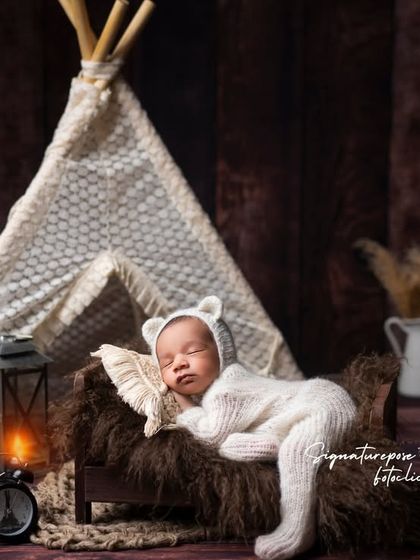 A duplicate of image 49, showing the full rustic camping theme for a newborn.