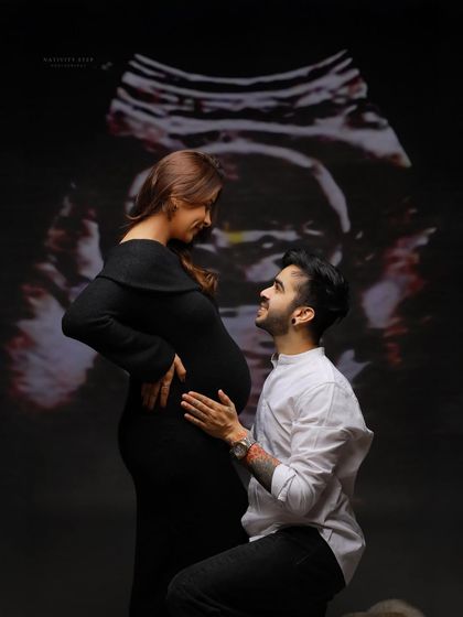 A unique and modern concept where we project the baby's ultrasound scan onto the background. It's a beautiful way to visually connect the parents with their unborn child.